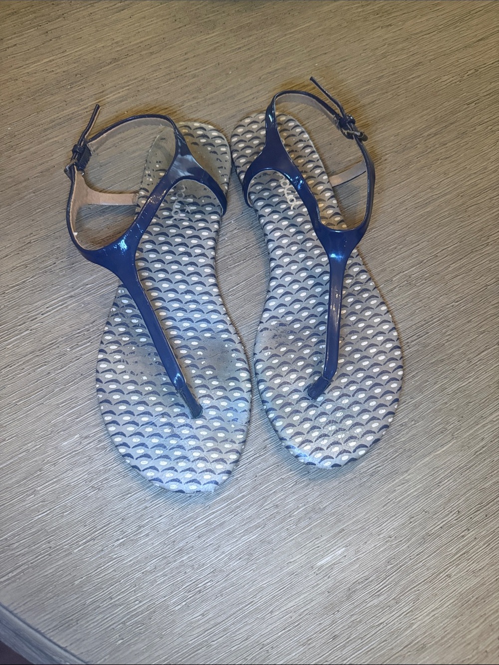 Anthropologie Glossy Navy T-Strap Sandals with Patterned Footbed